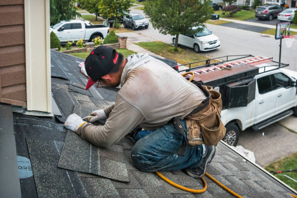 Professional Roofing technician working in Solon, IA